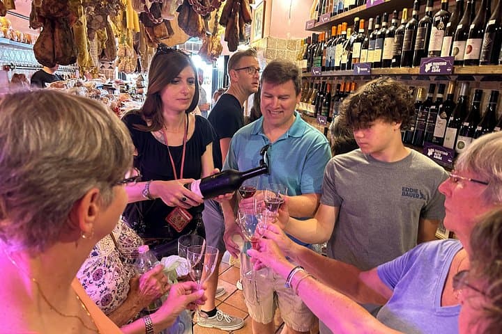 Having fun during our tour drinking local wine