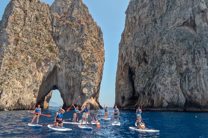 Stand up paddle in Capri with panoramic views of the island’s iconic cliffs and crystal-clear sea.