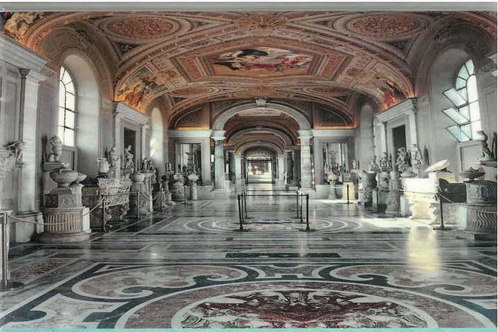 The Gallery of Candelabras features ancient Roman sculptures and massive marble candelabras, set along richly decorated vaulted ceilings—truly majestic!