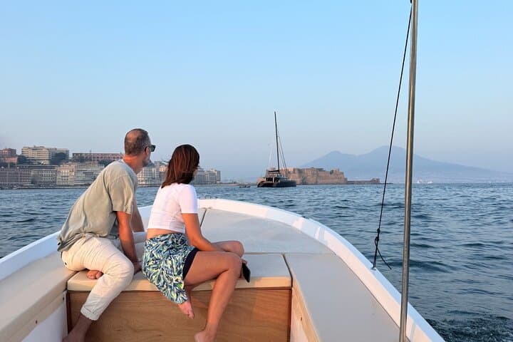 Boat experience along the coast of Naples and breathtaking views.