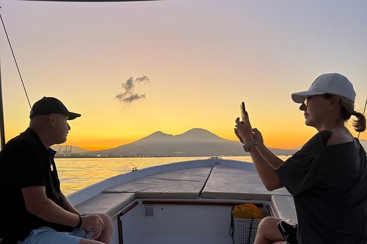 Boat experience along the coast of Naples and breathtaking views.