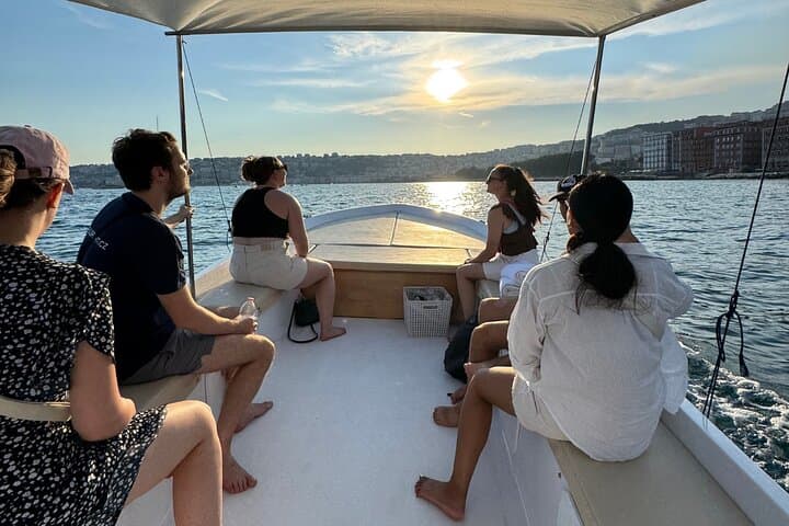 Boat experience along the coast of Naples and breathtaking views.