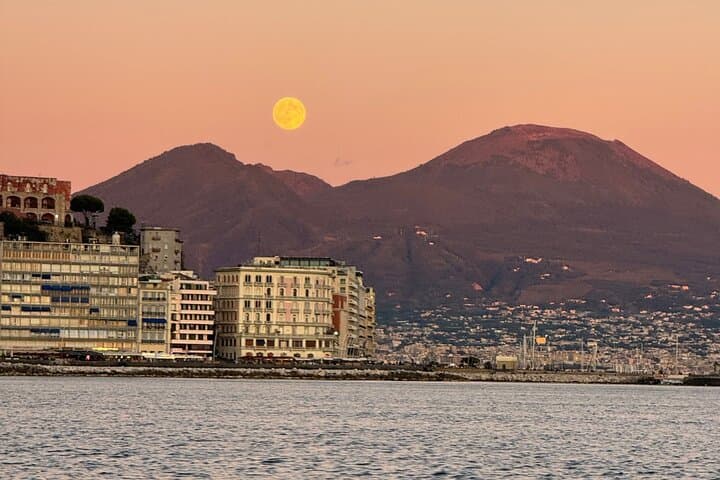 Boat experience along the coast of Naples and breathtaking views.