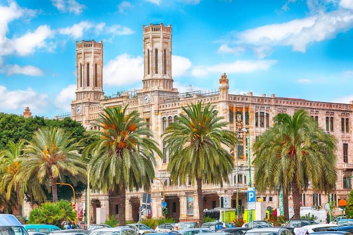 Palazzo Civico (City Inn): The elegant architecture combining Gothic-Aragonese style and Art Nouveau, facing the port.