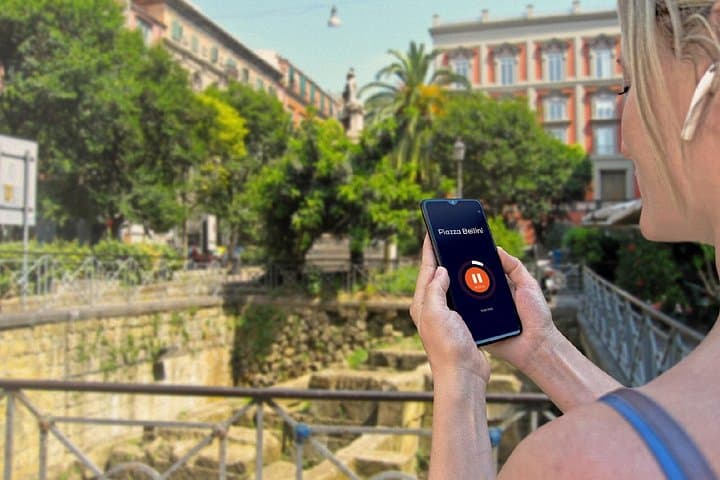 Visit Naples in freedom: Cultural break in front of the remains of the Greek walls of Piazza Bellini.