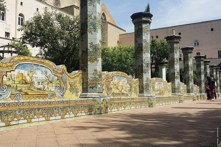 Chiostro di Santa Chiara: The famous cloister of the Clares, lined with magnificent majolicas (tiles) of the 18th century.