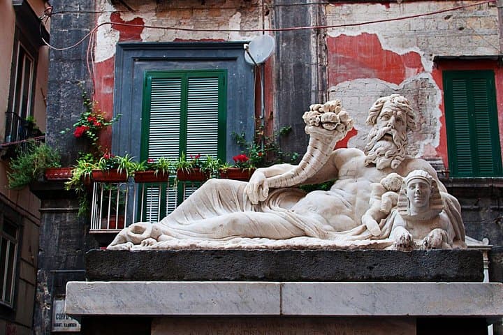 Statue of God Nile (Statua del Dio Nilo): The iconic Hellenistic sculpture located in the heart of the "Corpo di Napoli".