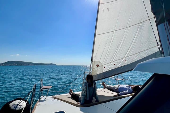 Catamaran tour stops bathing and snorkeling toast with prosecco