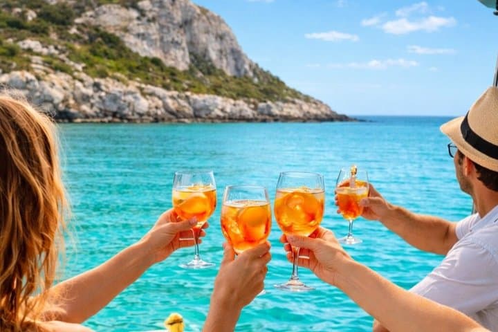 Catamaran tour stops bathing and snorkeling toast with prosecco