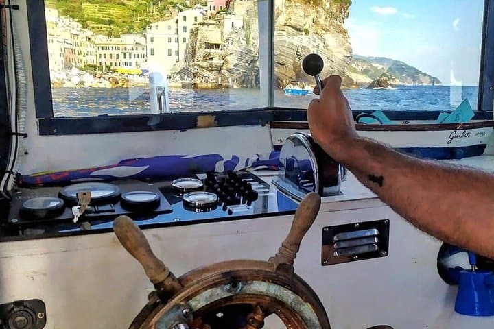 Cinque Terre daytime boat tour with a traditional ligurian gozzo