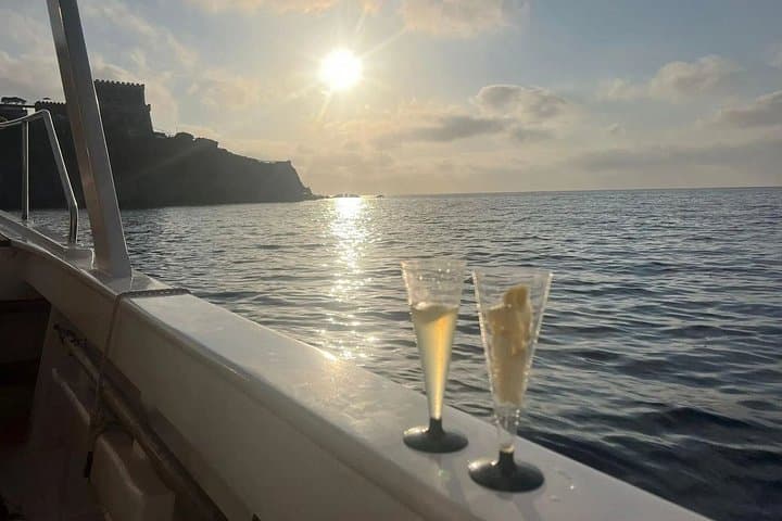 Sunset aperitif on the coast of Ischia by boat with skipper